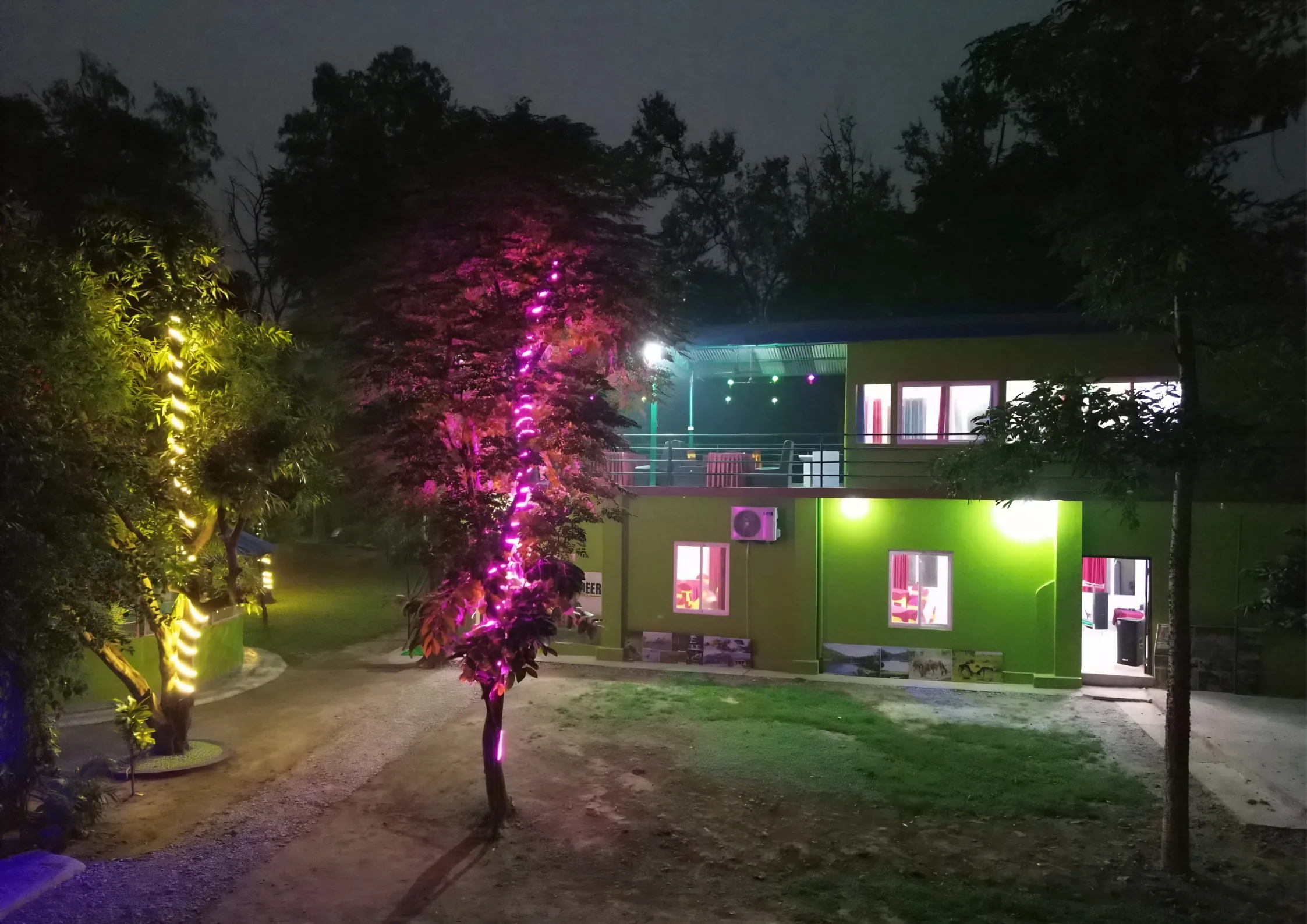 Shuklaphanta Jungle Cottage beautifully lit at night
