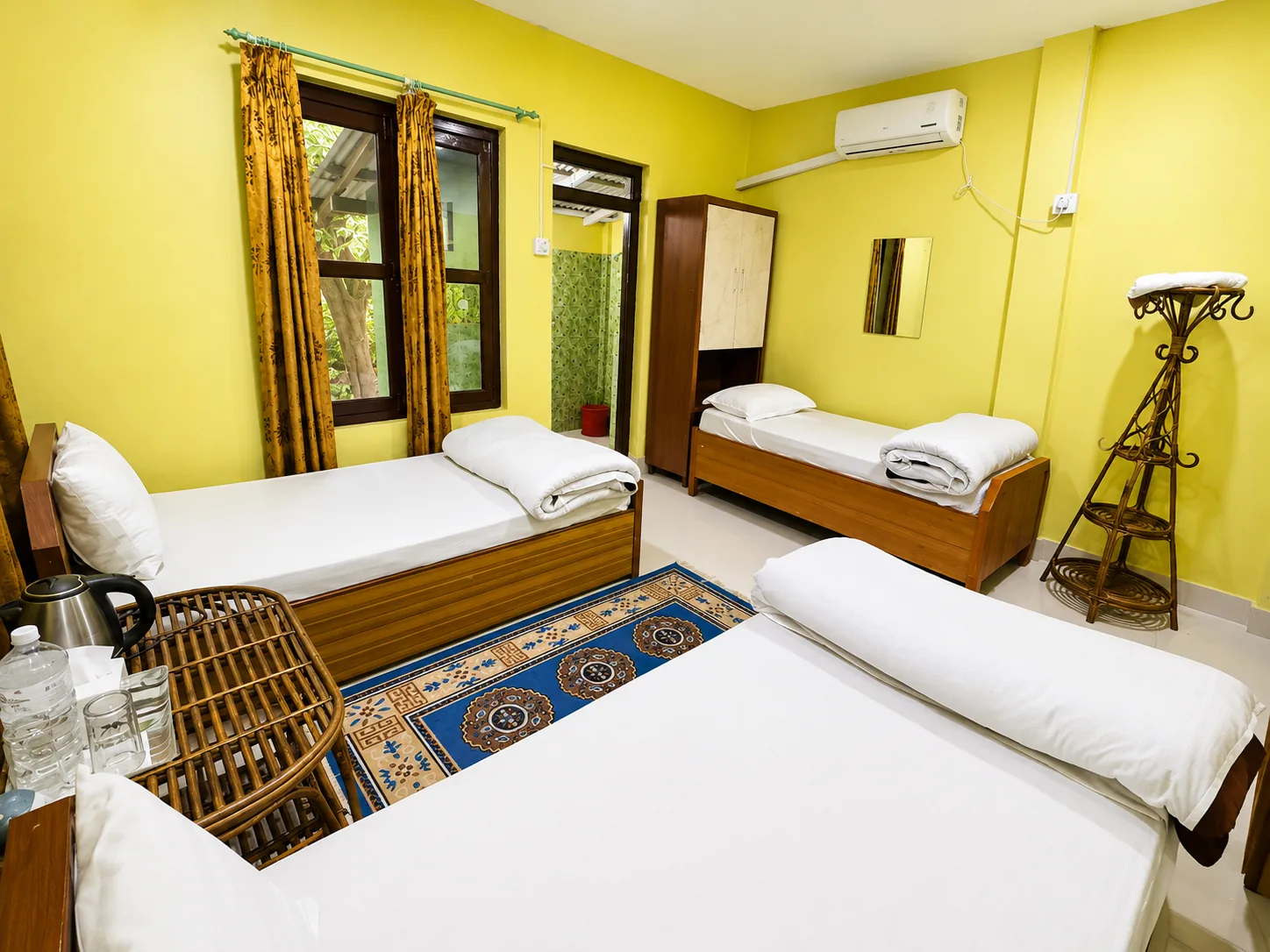 Triple bed room at Shuklaphanta Jungle Cottage